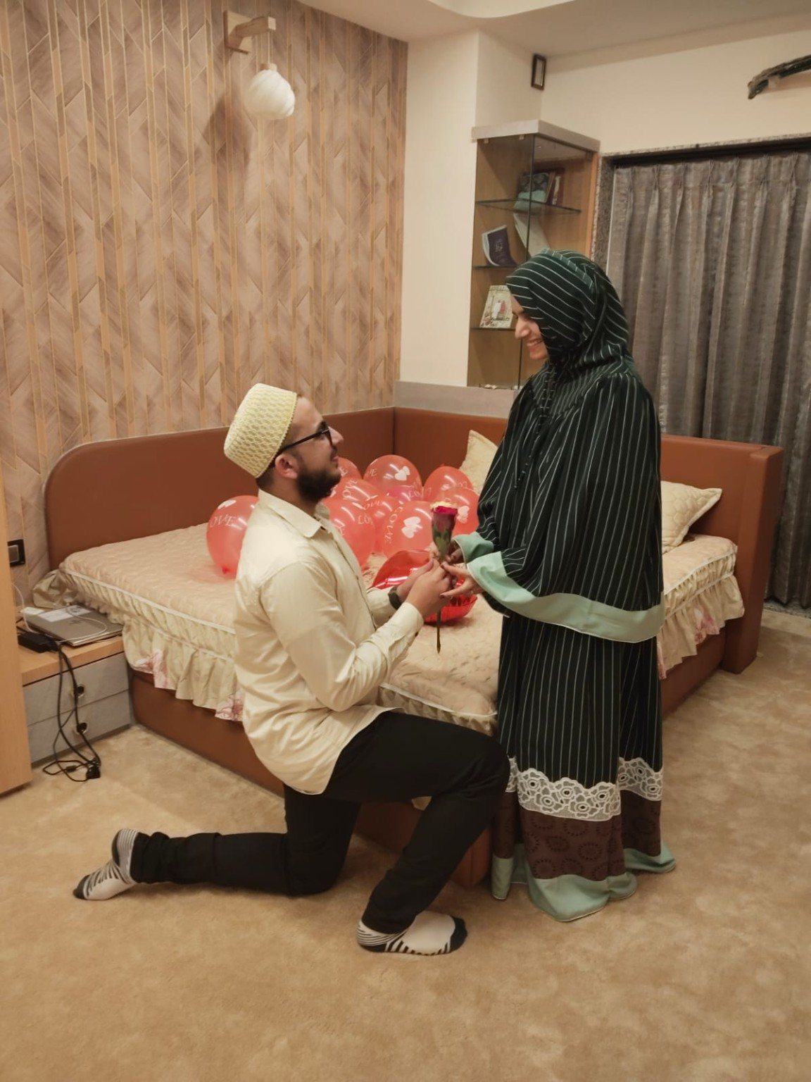Burhanuddin proposing to Mariya with a rose
