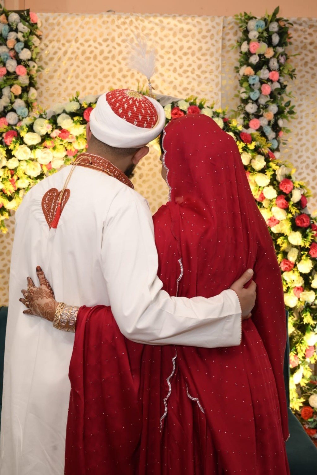 Mariya and Burhanuddin standing together at the end of their Nikah day